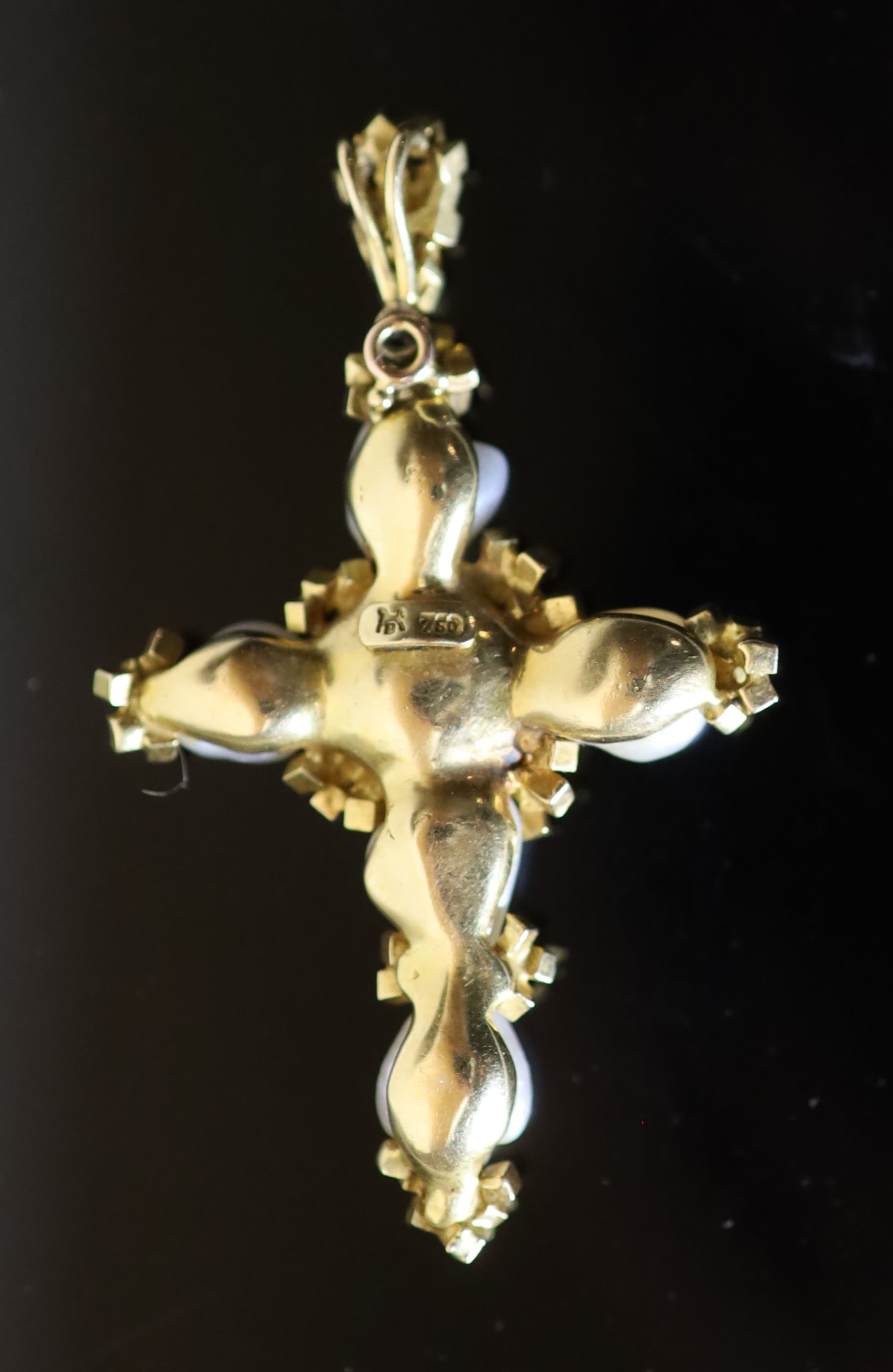 A 20th century continental 18ct gold and six stone baroque pearl set cross pendant,